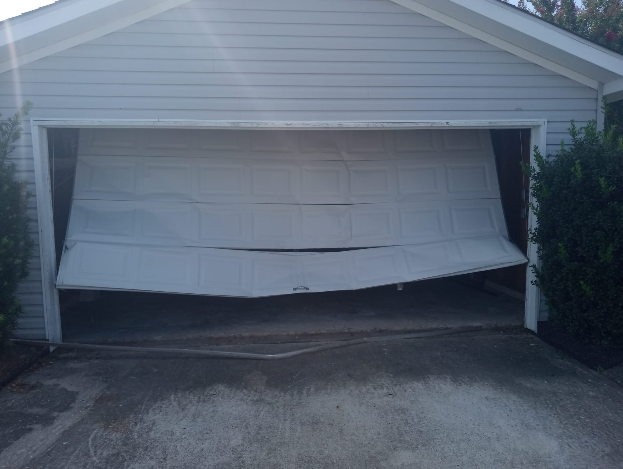 DIY vs Professional Garage Door Spring Repair Spring - Safety Risks + Cost Analysis - Lemus Garage Door Services Spring TX